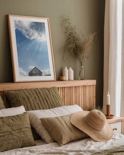 Barn Rays by Nathan Larson. shown as a paper print in a natural frame. Available as a archival giclee rolled canvas, fine art paper, or poster print. SKU 80449h.