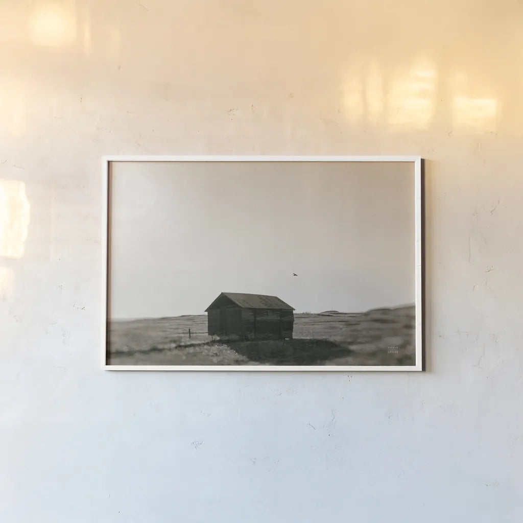 Barn Roost by Nathan Larson. shown as a paper print in a white frame. Available as a archival giclee rolled canvas, fine art paper, or poster print. SKU 92542i.