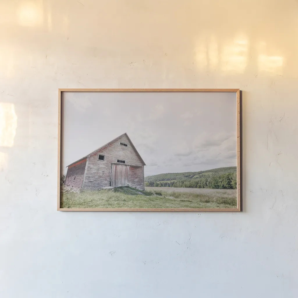 Barn With a View by Nathan Larson. shown as a paper print in a natural frame. Available as a archival giclee rolled canvas, fine art paper, or poster print. SKU 80450i.