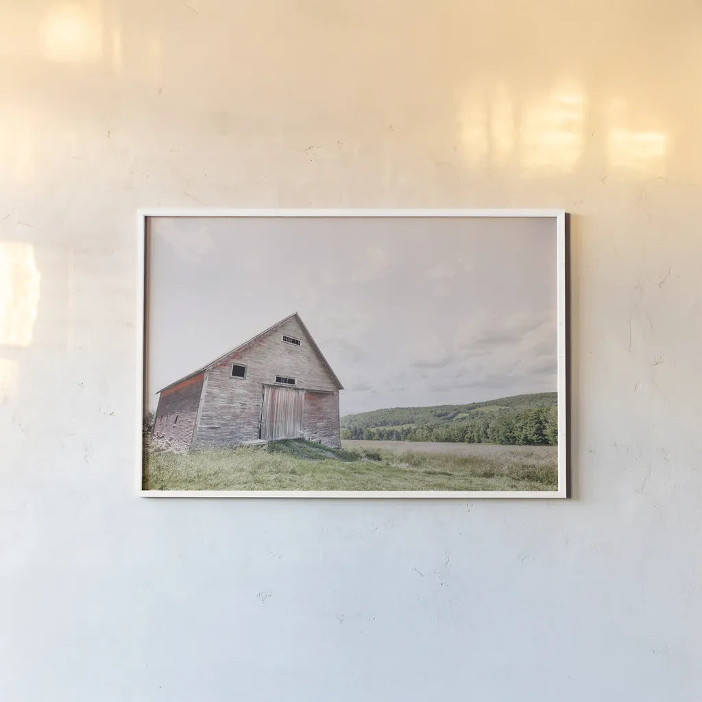 Barn With a View by Nathan Larson. shown as a paper print in a white frame. Available as a archival giclee rolled canvas, fine art paper, or poster print. SKU 80450i.