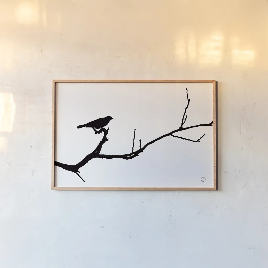 Bird Silhouette by Nathan Larson. shown as a paper print in a natural frame. Available as a archival giclee rolled canvas, fine art paper, or poster print. SKU 70278i.