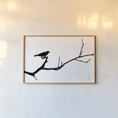 Bird Silhouette by Nathan Larson. shown as a paper print in a natural frame. Available as a archival giclee rolled canvas, fine art paper, or poster print. SKU 70278i.