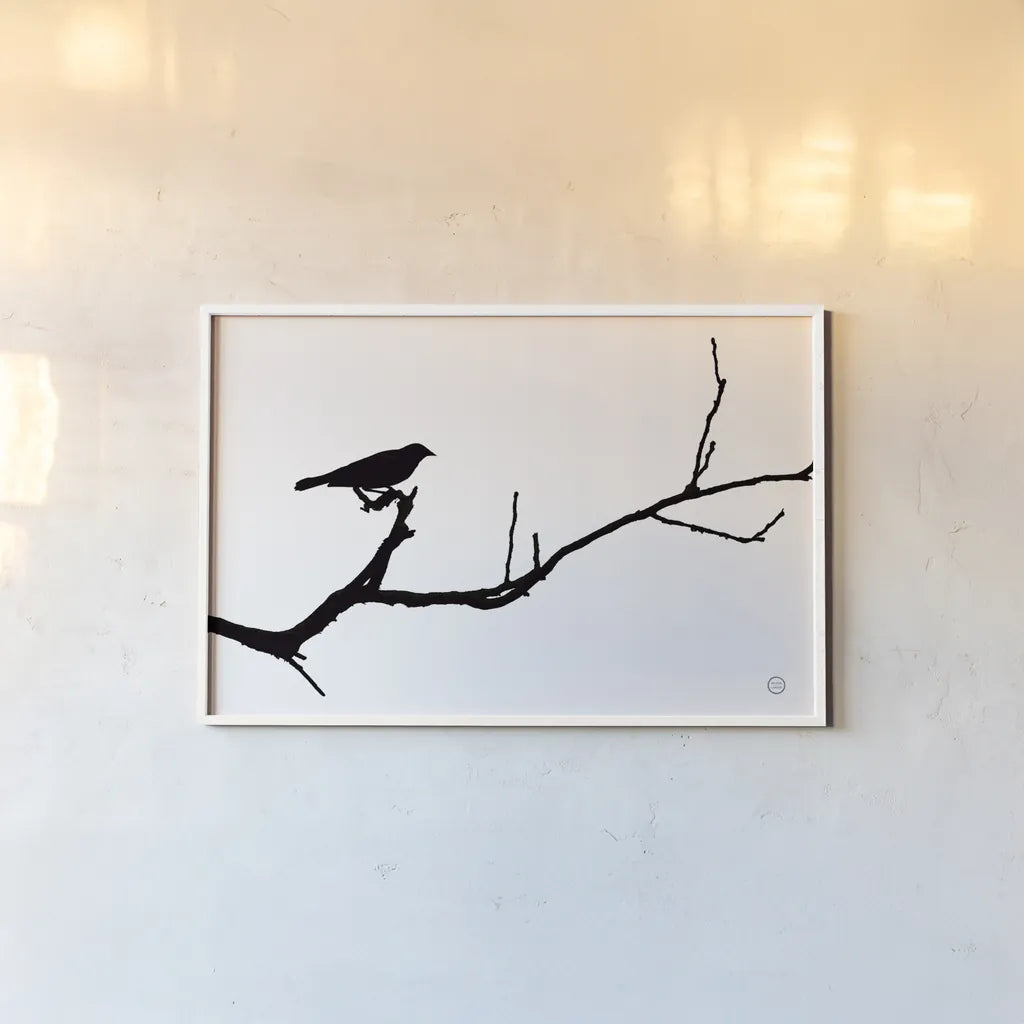 Bird Silhouette by Nathan Larson. shown as a paper print in a white frame. Available as a archival giclee rolled canvas, fine art paper, or poster print. SKU 70278i.