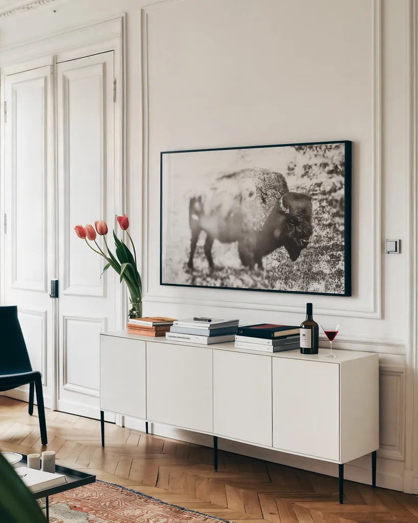 Bison Dream by Nathan Larson. shown as a framed stretched canvas in a living room above a console. Available as a archival giclee rolled canvas, fine art paper, or poster print. SKU 92543i.