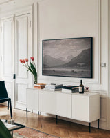 Bison Homeland by Nathan Larson. shown as a framed stretched canvas in a living room above a console. Available as a archival giclee rolled canvas, fine art paper, or poster print. SKU 92470i.