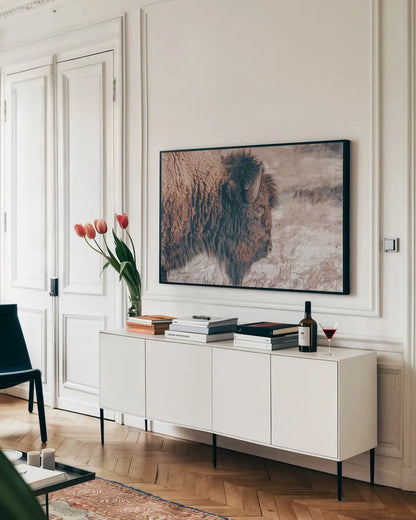 Bison Profile by Nathan Larson. shown as a framed stretched canvas in a living room above a console. Available as a archival giclee rolled canvas, fine art paper, or poster print. SKU 84255i.
