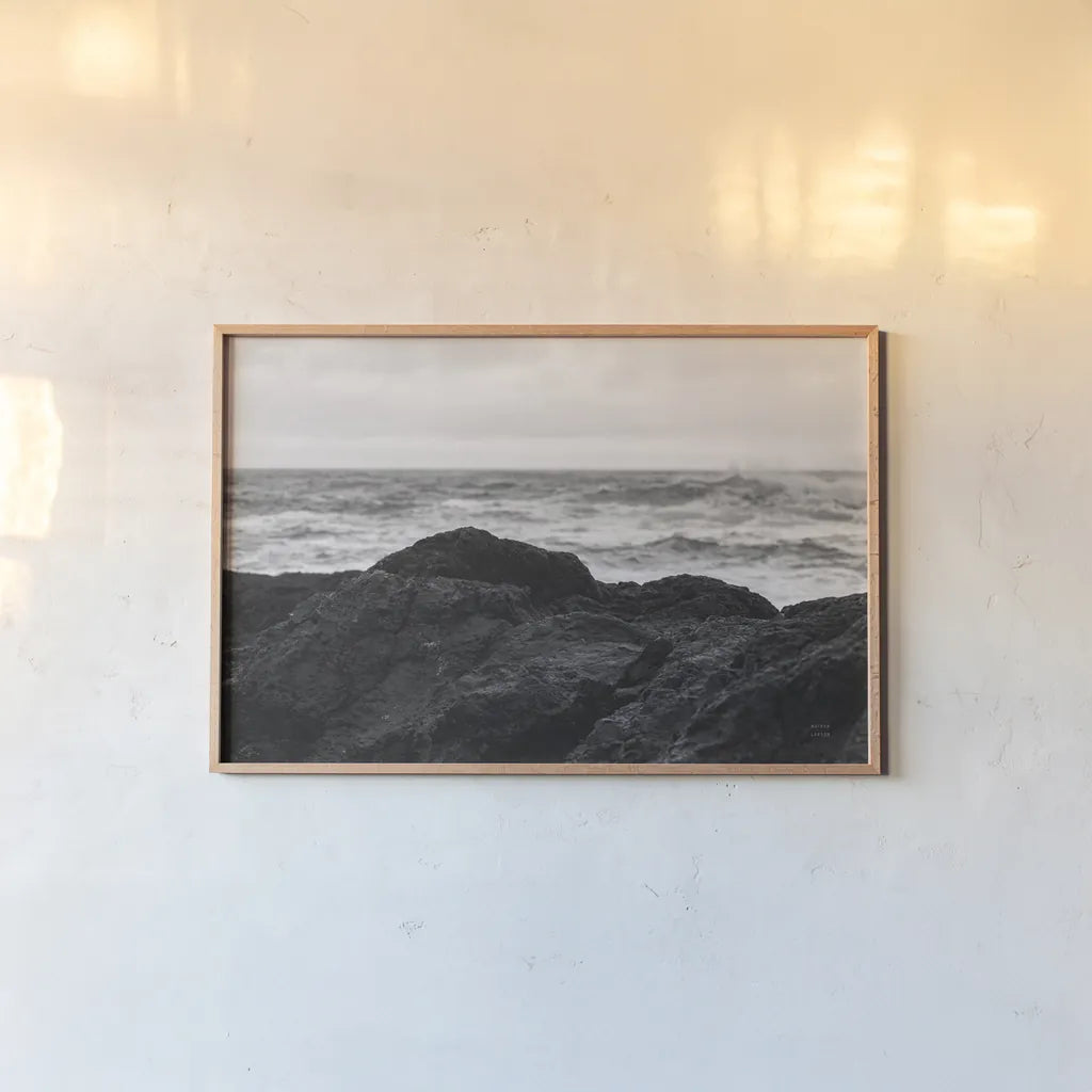 Black Rock Coast II by Nathan Larson. shown as a paper print in a natural frame. Available as a archival giclee rolled canvas, fine art paper, or poster print. SKU 90183i.