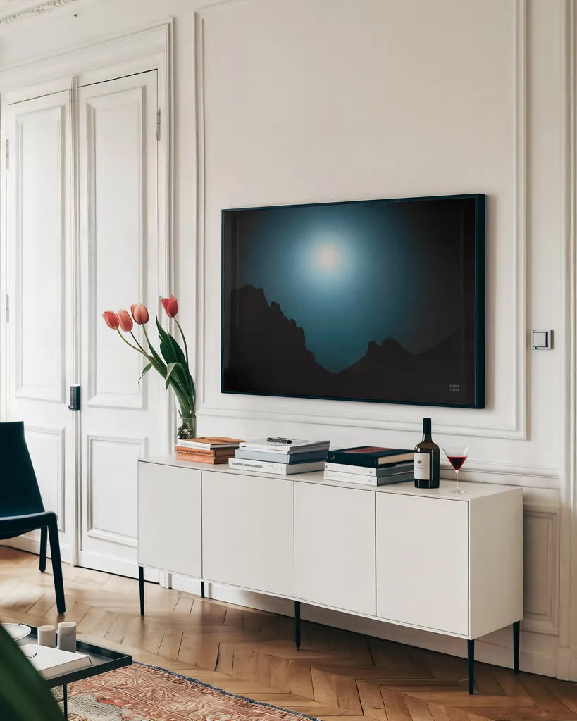 Blue Moon Desert by Nathan Larson. shown as a framed stretched canvas in a living room above a console. Available as a archival giclee rolled canvas, fine art paper, or poster print. SKU 76439i.