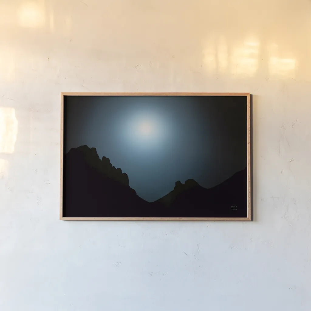 Blue Moon Desert by Nathan Larson. shown as a paper print in a natural frame. Available as a archival giclee rolled canvas, fine art paper, or poster print. SKU 76439i.