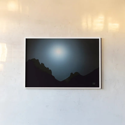 Blue Moon Desert by Nathan Larson. shown as a paper print in a white frame. Available as a archival giclee rolled canvas, fine art paper, or poster print. SKU 76439i.