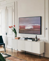 Boxcars by Nathan Larson. shown as a framed stretched canvas in a living room above a console. Available as a archival giclee rolled canvas, fine art paper, or poster print. SKU 96627i.