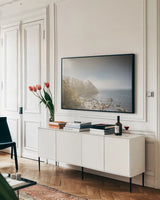 Breaking Through the Mist by Nathan Larson. shown as a framed stretched canvas in a living room above a console. Available as a archival giclee rolled canvas, fine art paper, or poster print. SKU 97438i.