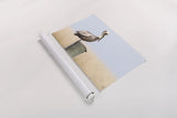 Brown Pelican by Nathan Larson. shown as a rolled paper print. Available as archival giclee rolled canvas, fine art paper, or poster print. SKU 104265i.