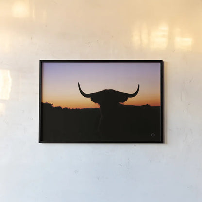 Bull Set by Nathan Larson. shown as a paper print in a black flame. Available as a archival giclee rolled canvas, fine art paper, or poster print. SKU 70279i.