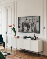 Buoy Wall BW by Nathan Larson. shown as a framed stretched canvas in a living room above a console. Available as a archival giclee rolled canvas, fine art paper, or poster print. SKU 103185i.