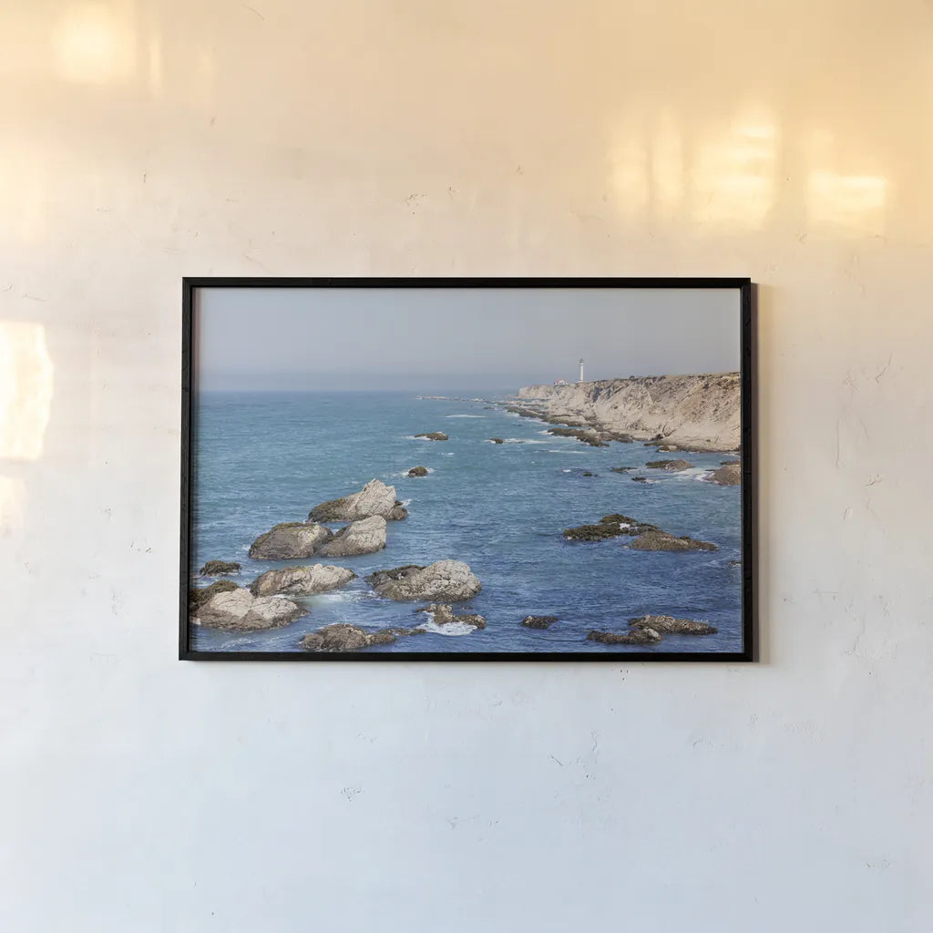 California Lighthouse by Nathan Larson. shown as a paper print in a black flame. Available as a archival giclee rolled canvas, fine art paper, or poster print. SKU 90177i.