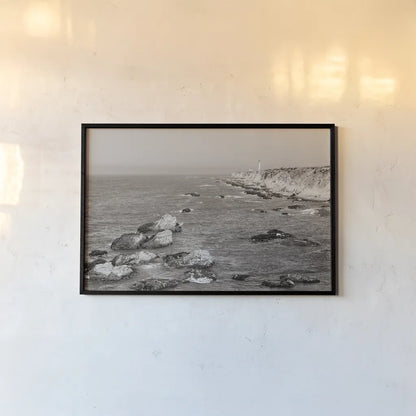 California Lighthouse BW by Nathan Larson. shown as a paper print in a black flame. Available as a archival giclee rolled canvas, fine art paper, or poster print. SKU 90179i.