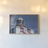 Cape Bona Vista Lighthouse II by Nathan Larson. shown as a paper print in a natural frame. Available as a archival giclee rolled canvas, fine art paper, or poster print. SKU 103220i.