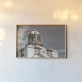 Cape Bona Vista Lighthouse II Desaturated by Nathan Larson. shown as a paper print in a natural frame. Available as a archival giclee rolled canvas, fine art paper, or poster print. SKU 103221i.