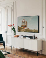 Cape Bona Vista Lighthouse III Color by Nathan Larson. shown as a framed stretched canvas in a living room above a console. Available as a archival giclee rolled canvas, fine art paper, or poster print. SKU 103224i.