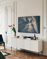 Carving Detail by Nathan Larson. shown as a framed stretched canvas in a living room above a console. Available as a archival giclee rolled canvas, fine art paper, or poster print. SKU 87636i.