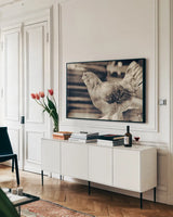 Chicken Barn I by Nathan Larson. shown as a framed stretched canvas in a living room above a console. Available as a archival giclee rolled canvas, fine art paper, or poster print. SKU 97955i.