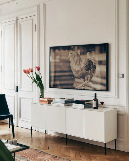 Chicken Barn III by Nathan Larson. shown as a framed stretched canvas in a living room above a console. Available as a archival giclee rolled canvas, fine art paper, or poster print. SKU 97957i.