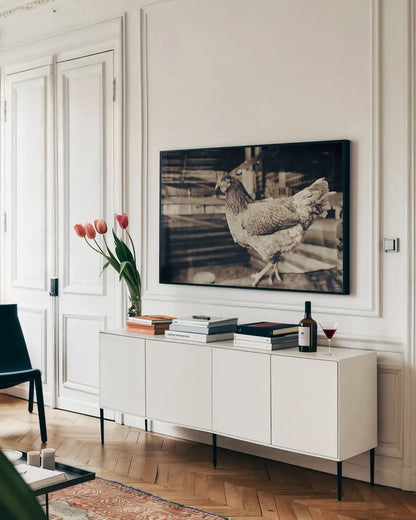 Chicken Barn VI by Nathan Larson. shown as a framed stretched canvas in a living room above a console. Available as a archival giclee rolled canvas, fine art paper, or poster print. SKU 97960i.