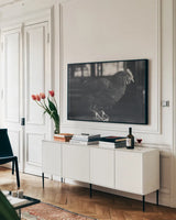 Chicken Watch by Nathan Larson. shown as a framed stretched canvas in a living room above a console. Available as a archival giclee rolled canvas, fine art paper, or poster print. SKU 97954i.
