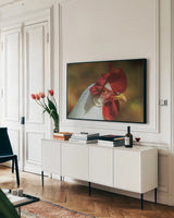 Chicken in the Sun I by Nathan Larson. shown as a framed stretched canvas in a living room above a console. Available as a archival giclee rolled canvas, fine art paper, or poster print. SKU 97582i.