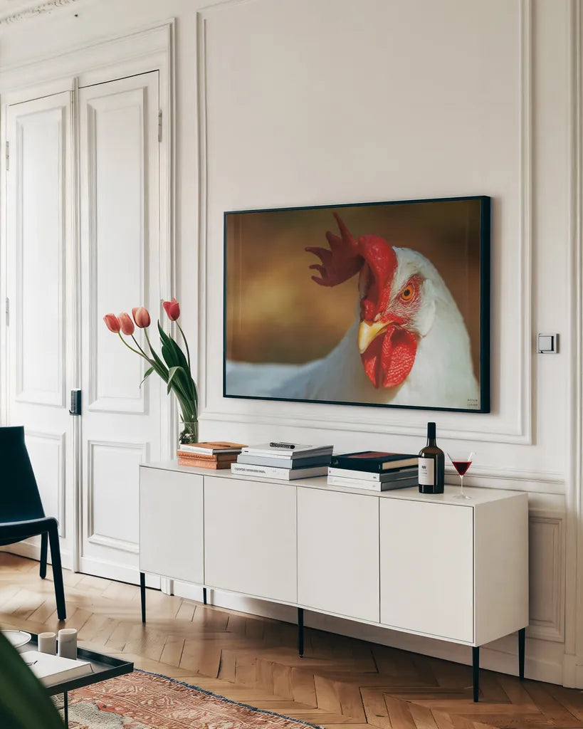 Chicken in the Sun II by Nathan Larson. shown as a framed stretched canvas in a living room above a console. Available as a archival giclee rolled canvas, fine art paper, or poster print. SKU 97583i.