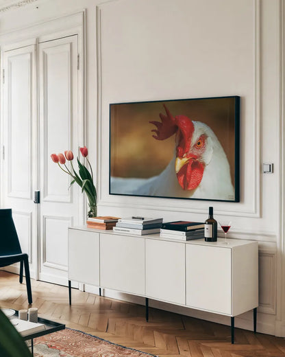 Chicken in the Sun II by Nathan Larson. shown as a framed stretched canvas in a living room above a console. Available as a archival giclee rolled canvas, fine art paper, or poster print. SKU 97583i.