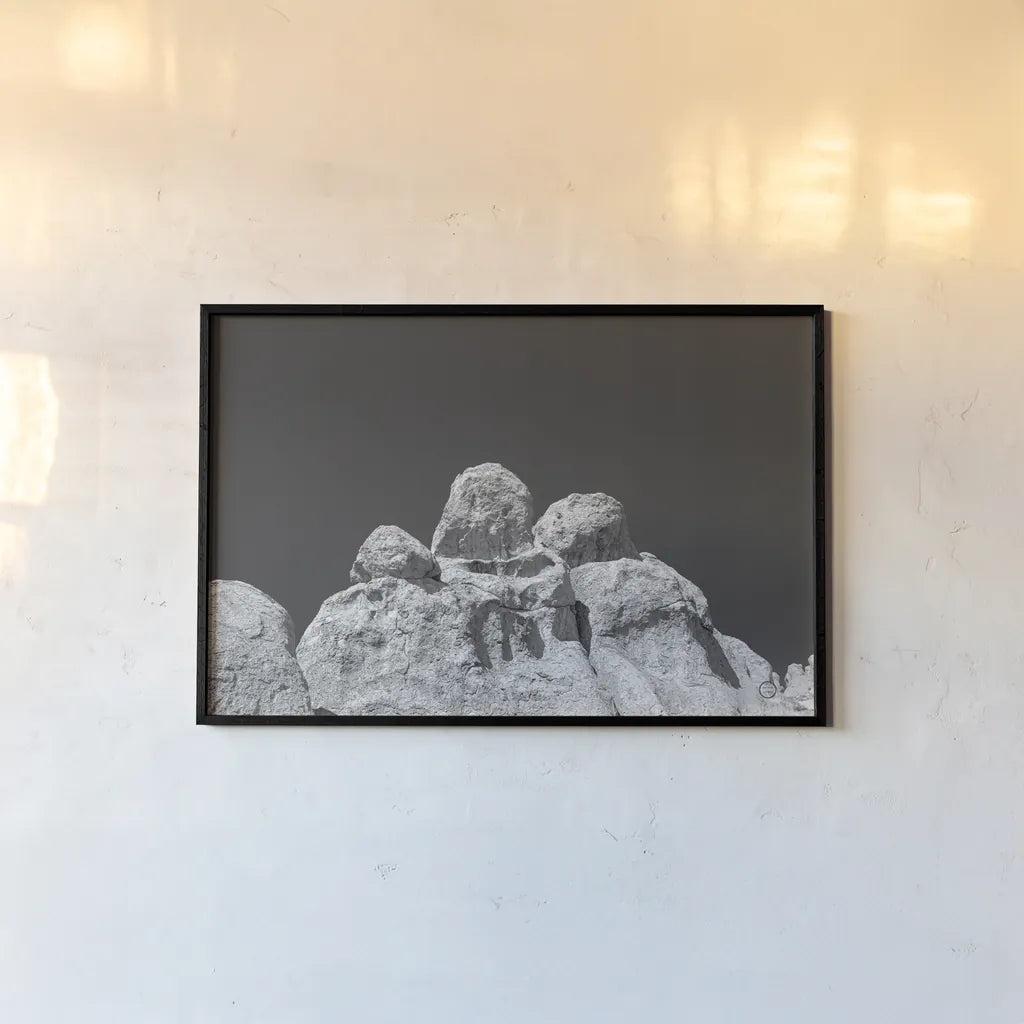 City of Rocks Formation by Nathan Larson. shown as a paper print in a black flame. Available as a archival giclee rolled canvas, fine art paper, or poster print. SKU 73734i.