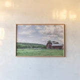 Cloud Harvest by Nathan Larson. shown as a paper print in a natural frame. Available as a archival giclee rolled canvas, fine art paper, or poster print. SKU 86415i.