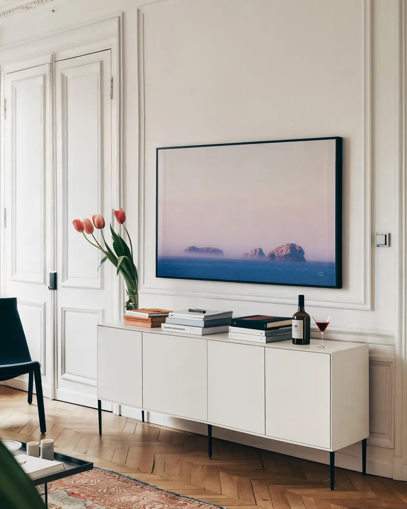 Coastline Sunset  by Nathan Larson. shown as a framed stretched canvas in a living room above a console. Available as a archival giclee rolled canvas, fine art paper, or poster print. SKU 90180i.