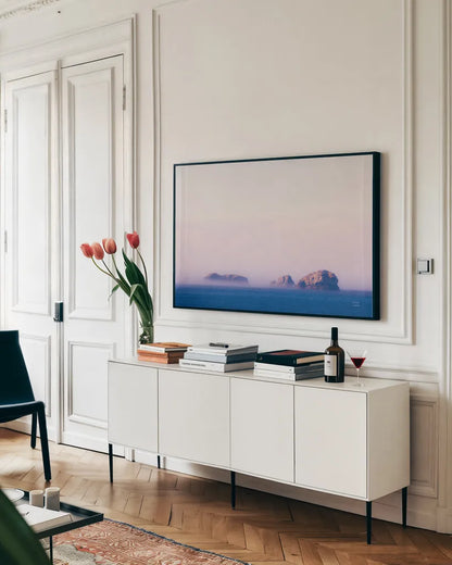 Coastline Sunset  by Nathan Larson. shown as a framed stretched canvas in a living room above a console. Available as a archival giclee rolled canvas, fine art paper, or poster print. SKU 90180i.