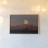 Cold Moon by Nathan Larson. shown as a paper print in a natural frame. Available as a archival giclee rolled canvas, fine art paper, or poster print. SKU 103217i.