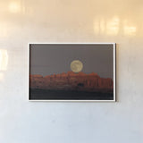 Cold Moon by Nathan Larson. shown as a paper print in a white frame. Available as a archival giclee rolled canvas, fine art paper, or poster print. SKU 103217i.
