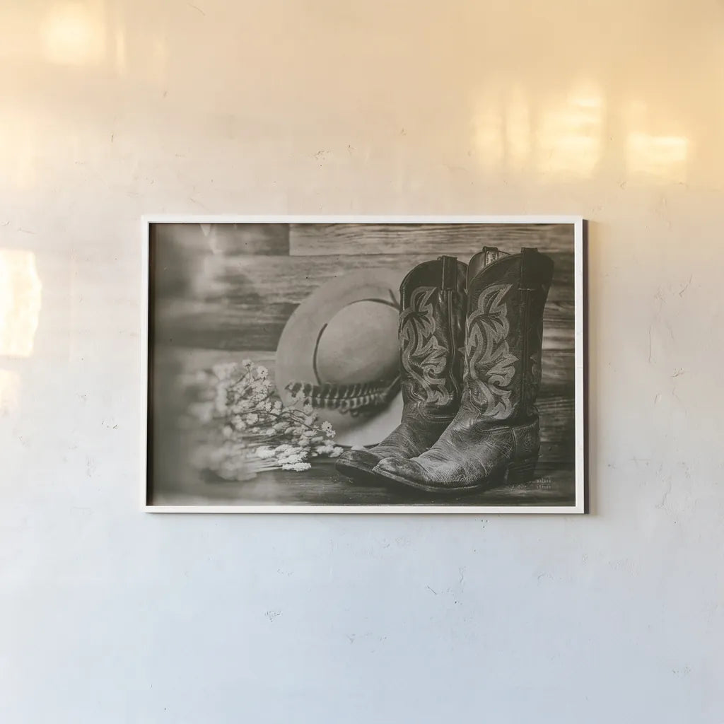 Cowboy Boots II by Nathan Larson. shown as a paper print in a white frame. Available as a archival giclee rolled canvas, fine art paper, or poster print. SKU 82728i.