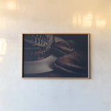 Cowboy Boots IV by Nathan Larson. shown as a paper print in a natural frame. Available as a archival giclee rolled canvas, fine art paper, or poster print. SKU 82730i.