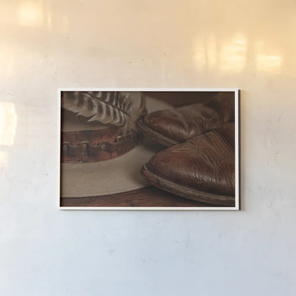 Cowboy Boots IV Warm by Nathan Larson. shown as a paper print in a white frame. Available as a archival giclee rolled canvas, fine art paper, or poster print. SKU 82737i.