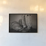Cowboy Boots IX by Nathan Larson. shown as a paper print in a black flame. Available as a archival giclee rolled canvas, fine art paper, or poster print. SKU 82735i.