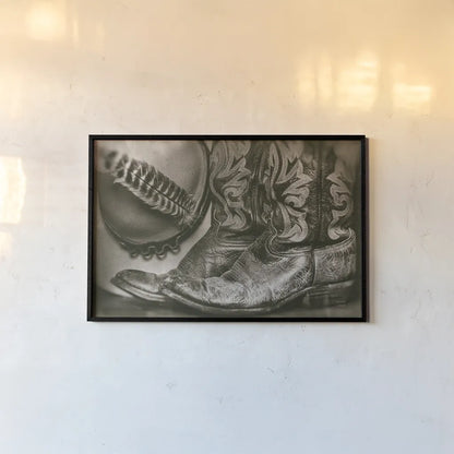 Cowboy Boots VII by Nathan Larson. shown as a paper print in a black flame. Available as a archival giclee rolled canvas, fine art paper, or poster print. SKU 82733i.