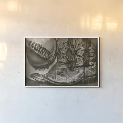 Cowboy Boots VII by Nathan Larson. shown as a paper print in a white frame. Available as a archival giclee rolled canvas, fine art paper, or poster print. SKU 82733i.