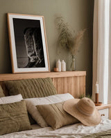 Cowboy Boots VIII BW by Nathan Larson. shown as a paper print in a natural frame. Available as a archival giclee rolled canvas, fine art paper, or poster print. SKU 82739h.
