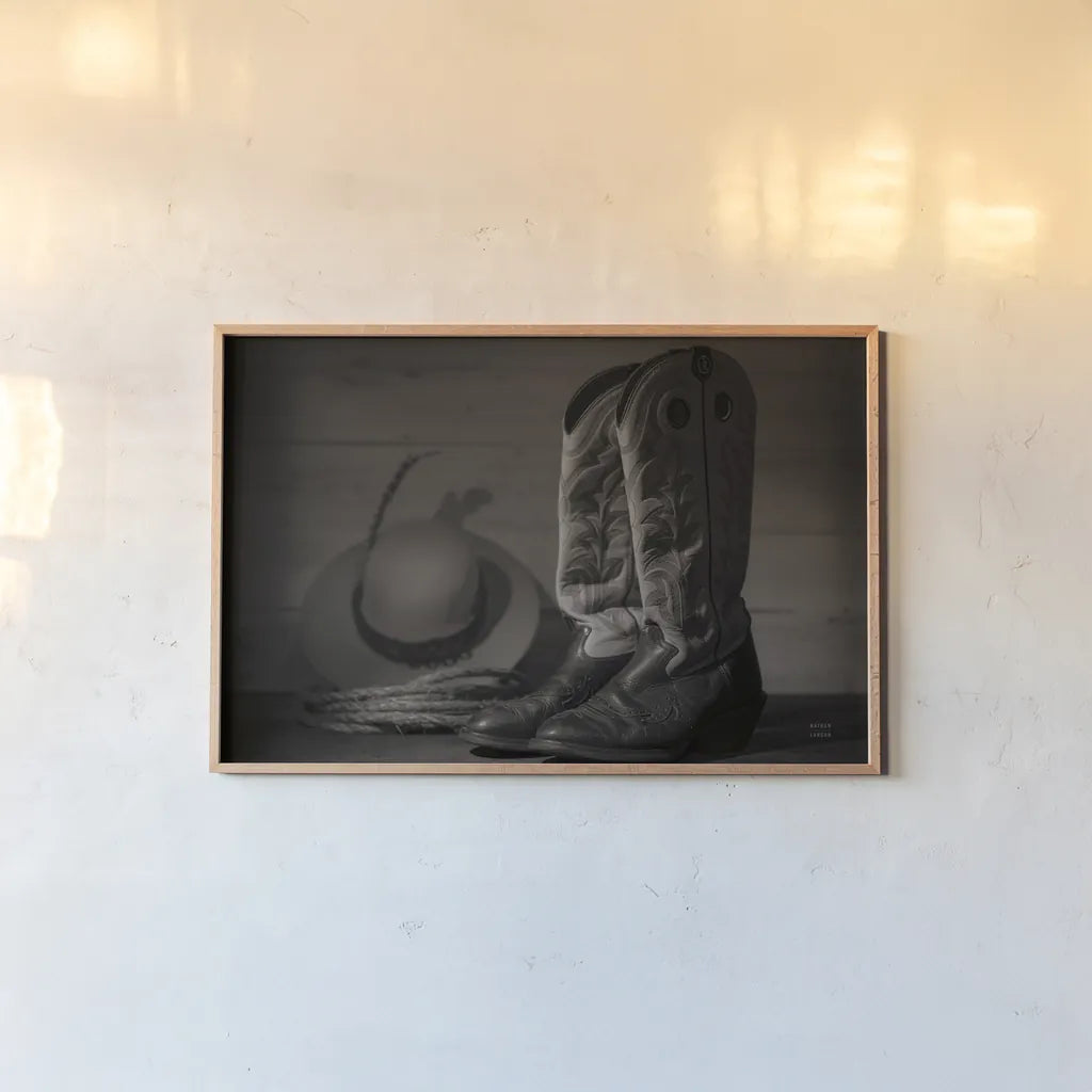 Cowboy Boots X BW by Nathan Larson. shown as a paper print in a natural frame. Available as a archival giclee rolled canvas, fine art paper, or poster print. SKU 82740i.