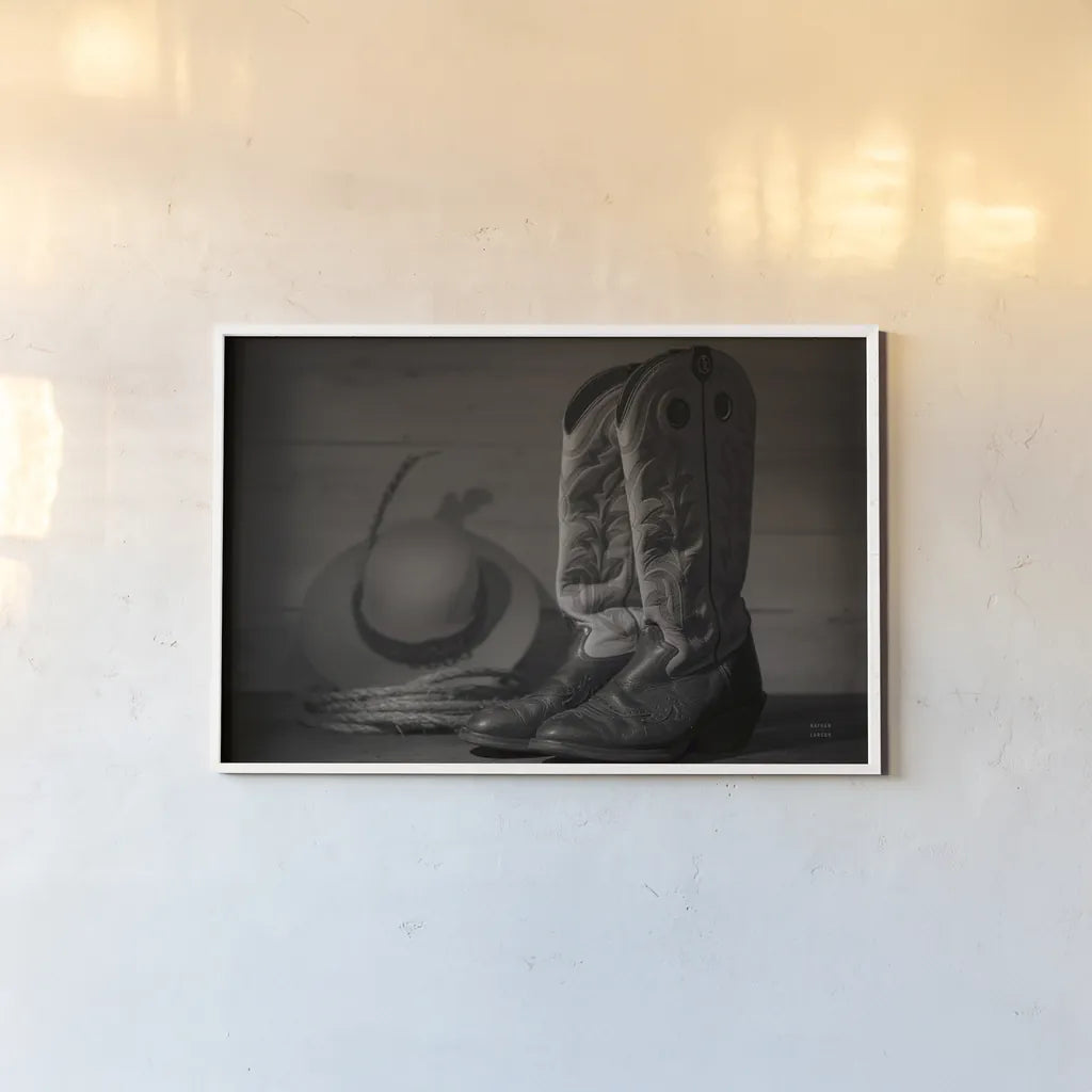 Cowboy Boots X BW by Nathan Larson. shown as a paper print in a white frame. Available as a archival giclee rolled canvas, fine art paper, or poster print. SKU 82740i.