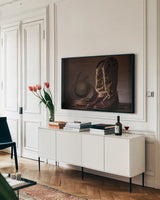 Cowboy Boots X Warm by Nathan Larson. shown as a framed stretched canvas in a living room above a console. Available as a archival giclee rolled canvas, fine art paper, or poster print. SKU 82738i.
