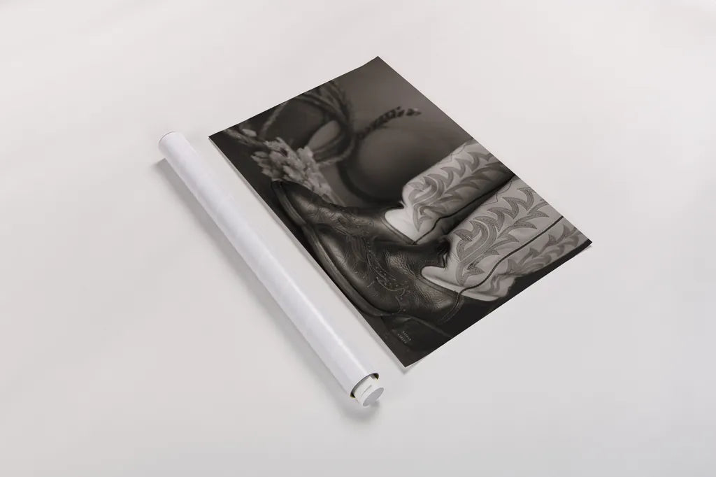 Cowboy Boots XI BW by Nathan Larson. shown as a rolled paper print. Available as archival giclee rolled canvas, fine art paper, or poster print. SKU 82741i.