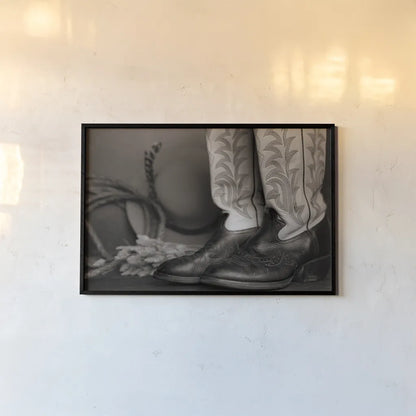 Cowboy Boots XI BW by Nathan Larson. shown as a paper print in a black flame. Available as a archival giclee rolled canvas, fine art paper, or poster print. SKU 82741i.
